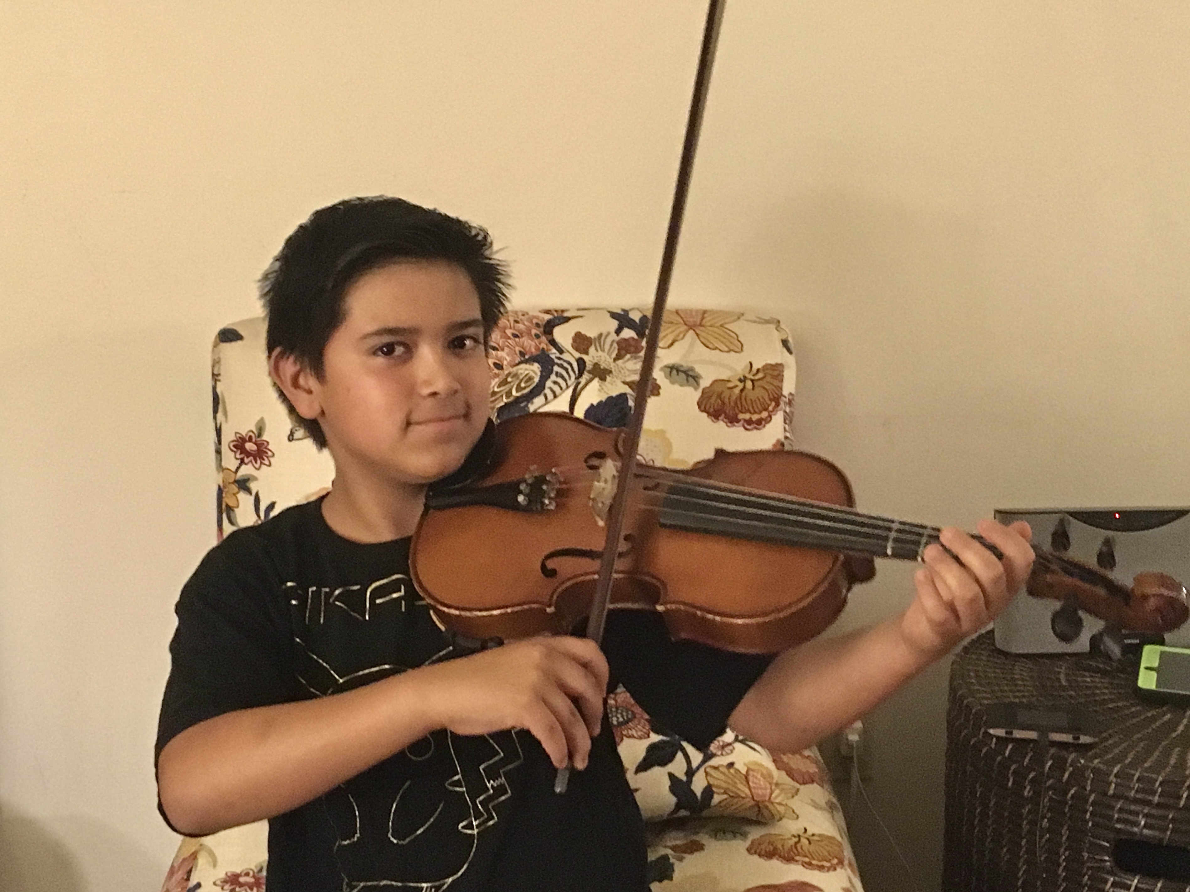 Holding my viola in 6th grade